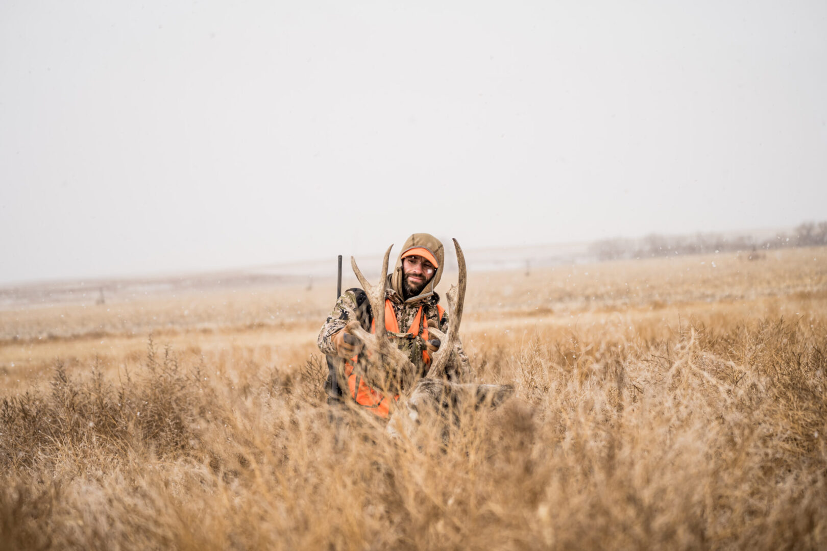 Hunter with an elk